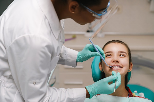 Should I Take My Child To A Kid Friendly Dentist In Solvang For White Spots On Teeth?